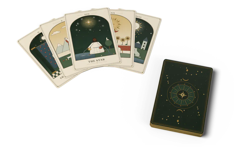 Five illustrated tarot cards fanned in a gentle arc, The Star in the centre, beside a squared stack of face-down cards with gilt edges.